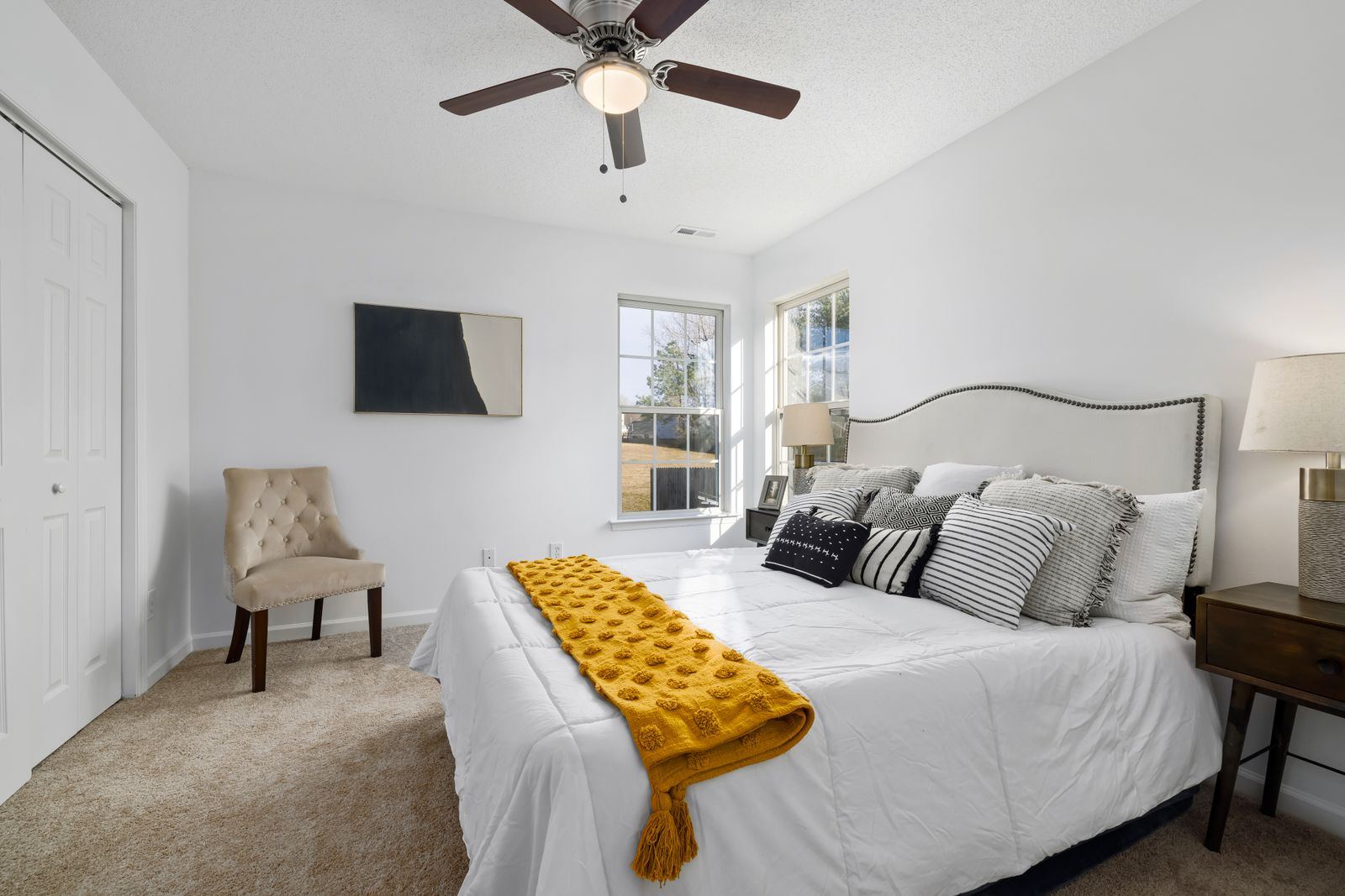 Bright bedroom with fresh white bedding